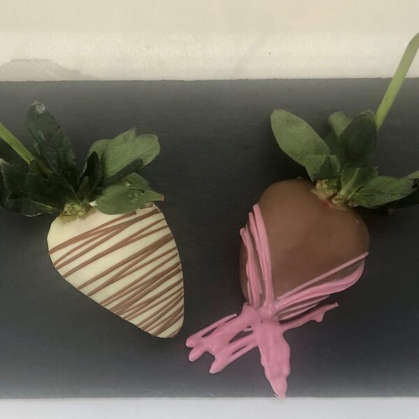 Photo of chocolate-covered strawberries on long stem