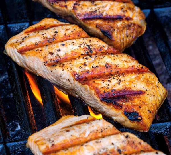 Grilled salmon steaks on the grill.